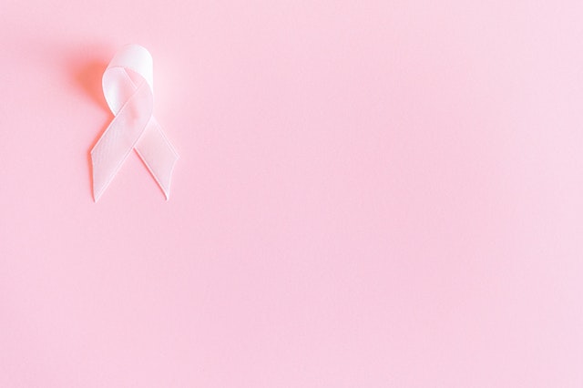 pink-ribbon-on-pink-surface